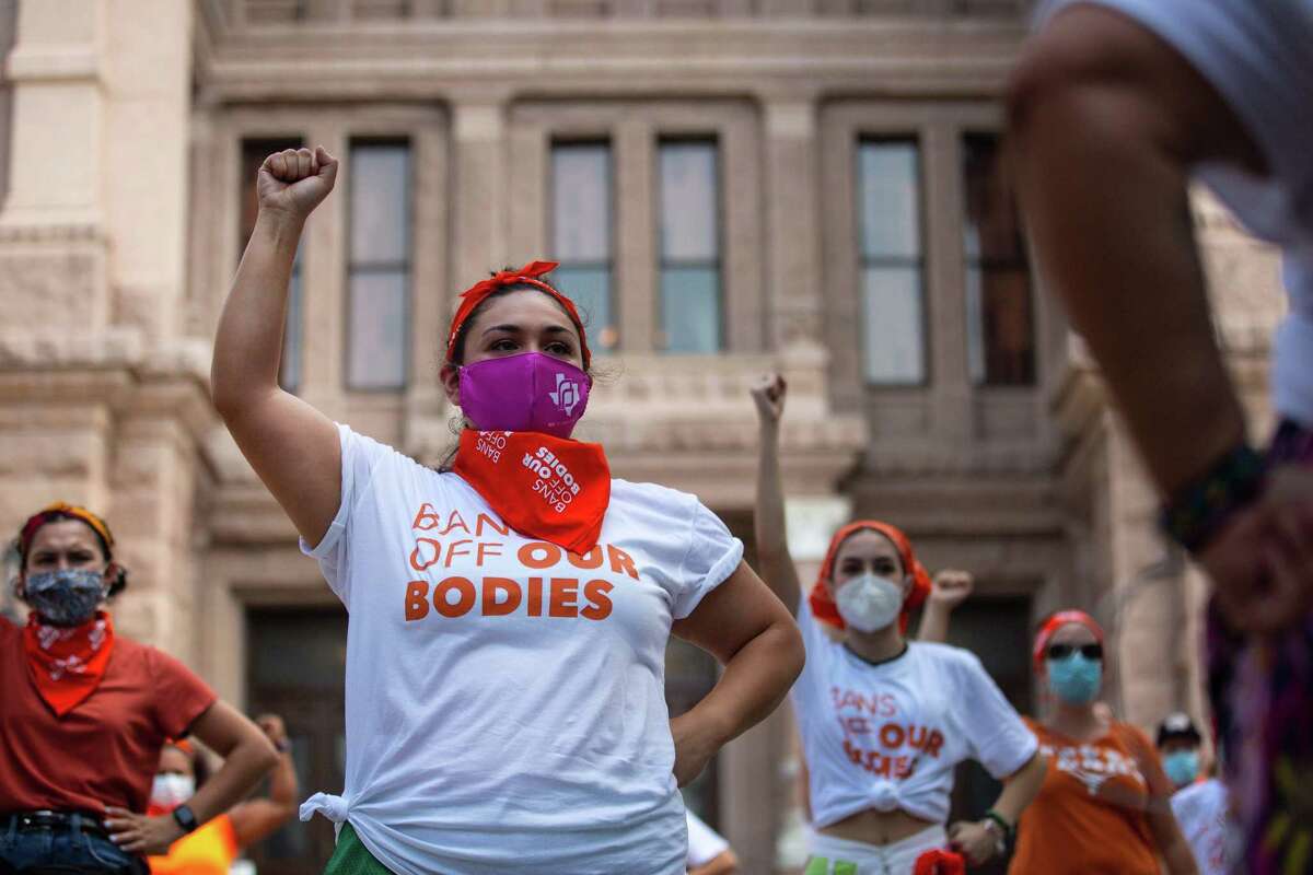 Demonstrators protest against the new state law creating an almost complete ban on abortions in Texas, outside the State Capitol in Austin, Wednesday, Sept. 1, 2021. To protest Texas?•s new abortion law, activists said they flooded the website set up by the state?•s largest anti-abortion group with fake tips. (Montinique Monroe/The New York Times)