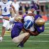LaSalle Institue running back Matt Bott is tackled by CBA defenders Jahmir Pitcher (left) and Jaylen Riggins during the season opener for both teams at CBA in Colonie, NY, on Friday, Sept. 3, 2021. (Jim Franco/Special to the Times Union)