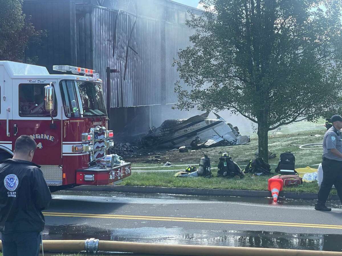 A small jet crashed into the Trumpf Inc. building on Hyde Road in Farmington on Sept. 2, killing four people aboard, authorities said.