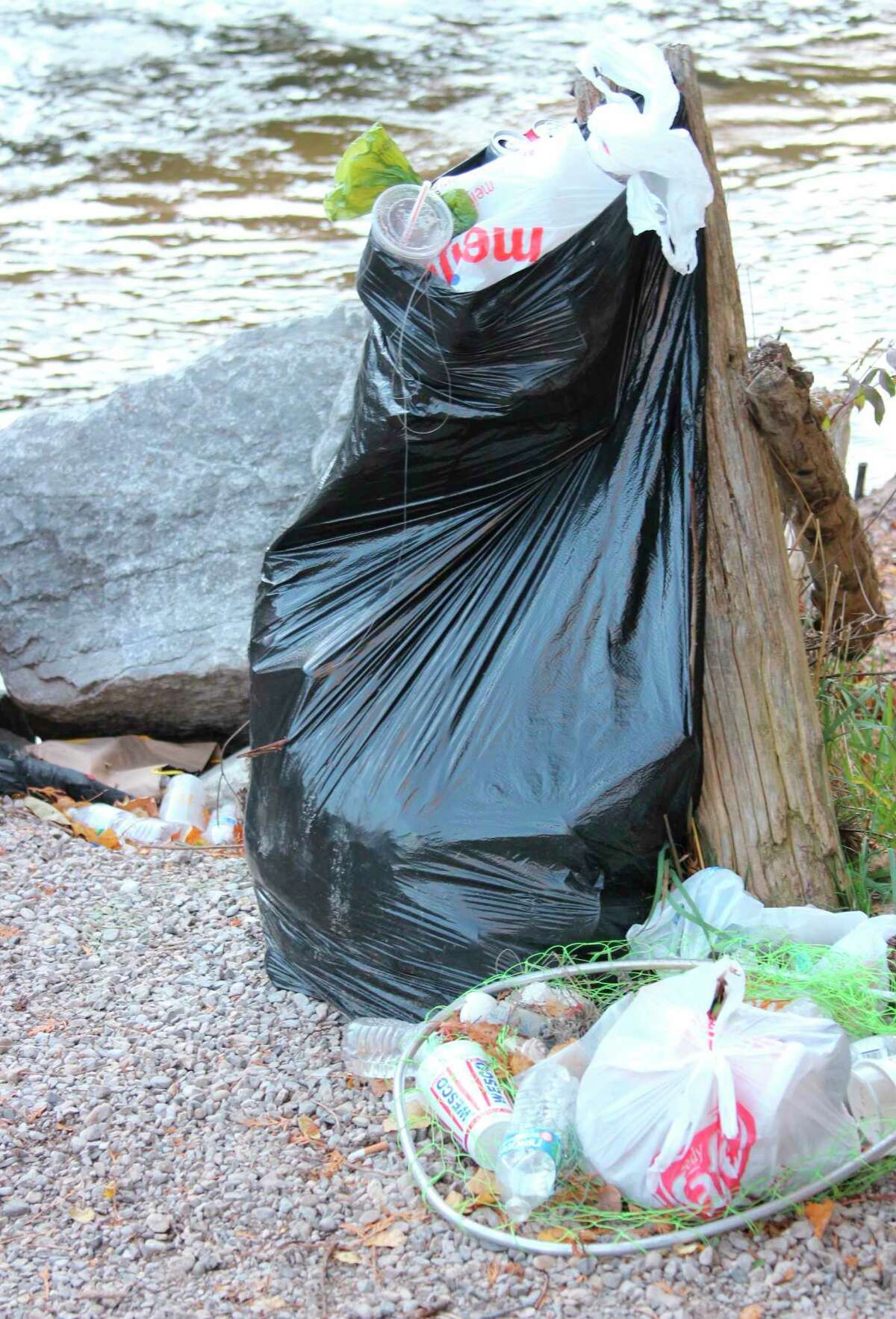 Garbage left at the Homestead Dam after the 2020 salmon run was a common sight as the river there is popular with anglers. The DNR is reminding anglers to clean up after themselves. (File Photo)