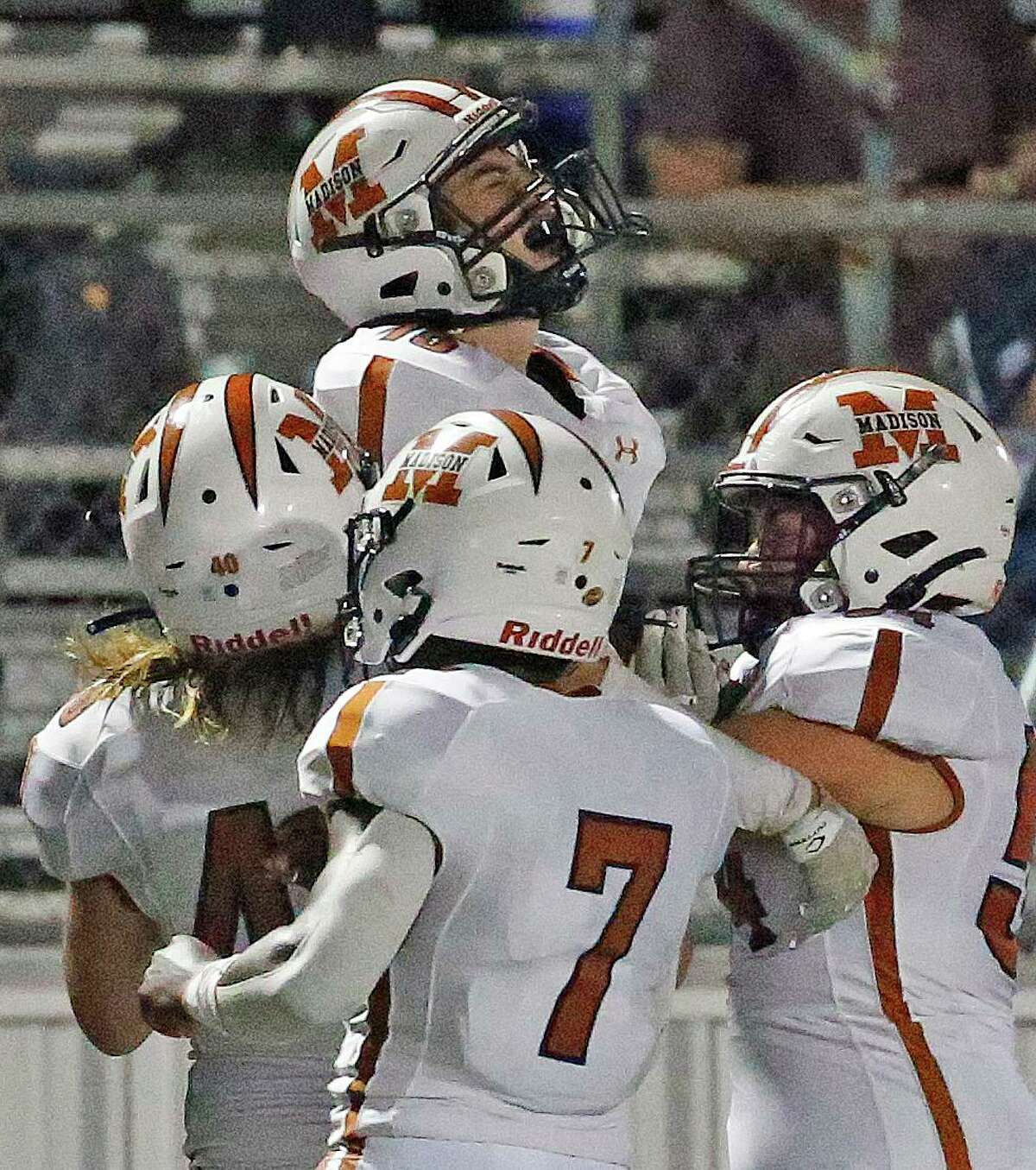 Madison Damian Mendoza(15) is lifted up by teammates after his interception stopped a Smithson Valley drive at Smithson Valley HS on Friday, Sept. 3. 2021.