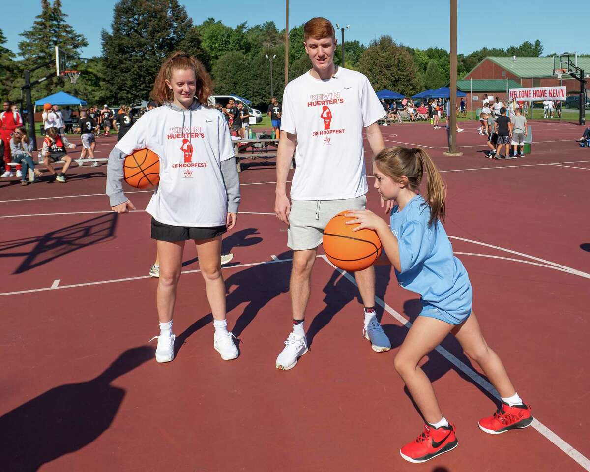 Kevin Huerter, a former hoops star at Shenendehowa and current Atlanta Hawks player, and his sister Jillian instruct participants at the Kevin Huerter's 518 Hoopfest at the Clifton Common basketball courts in Clifton Park, NY, on Saturday, Sept. 4, 2021. (Jim Franco/Special to the Times Union)