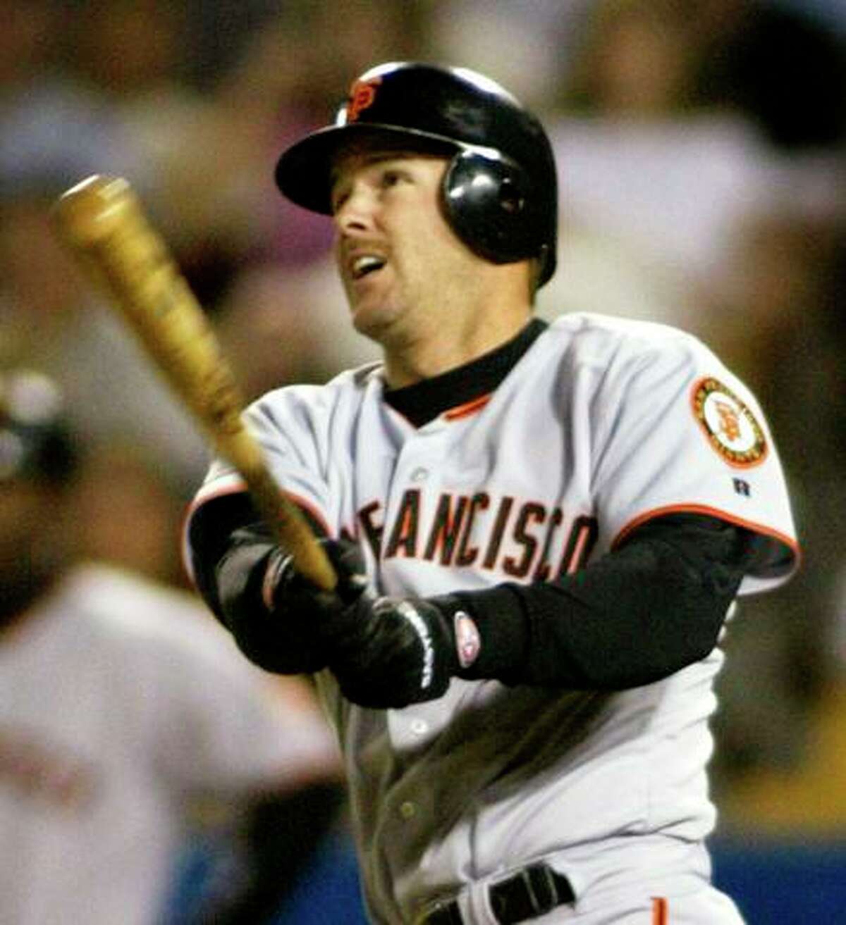 Giants second baseman Jeff Kent watches his solo home run sail into the left-field seats in the first inning of a game against the Los Angeles Dodgers on Sept. 16, 2002.