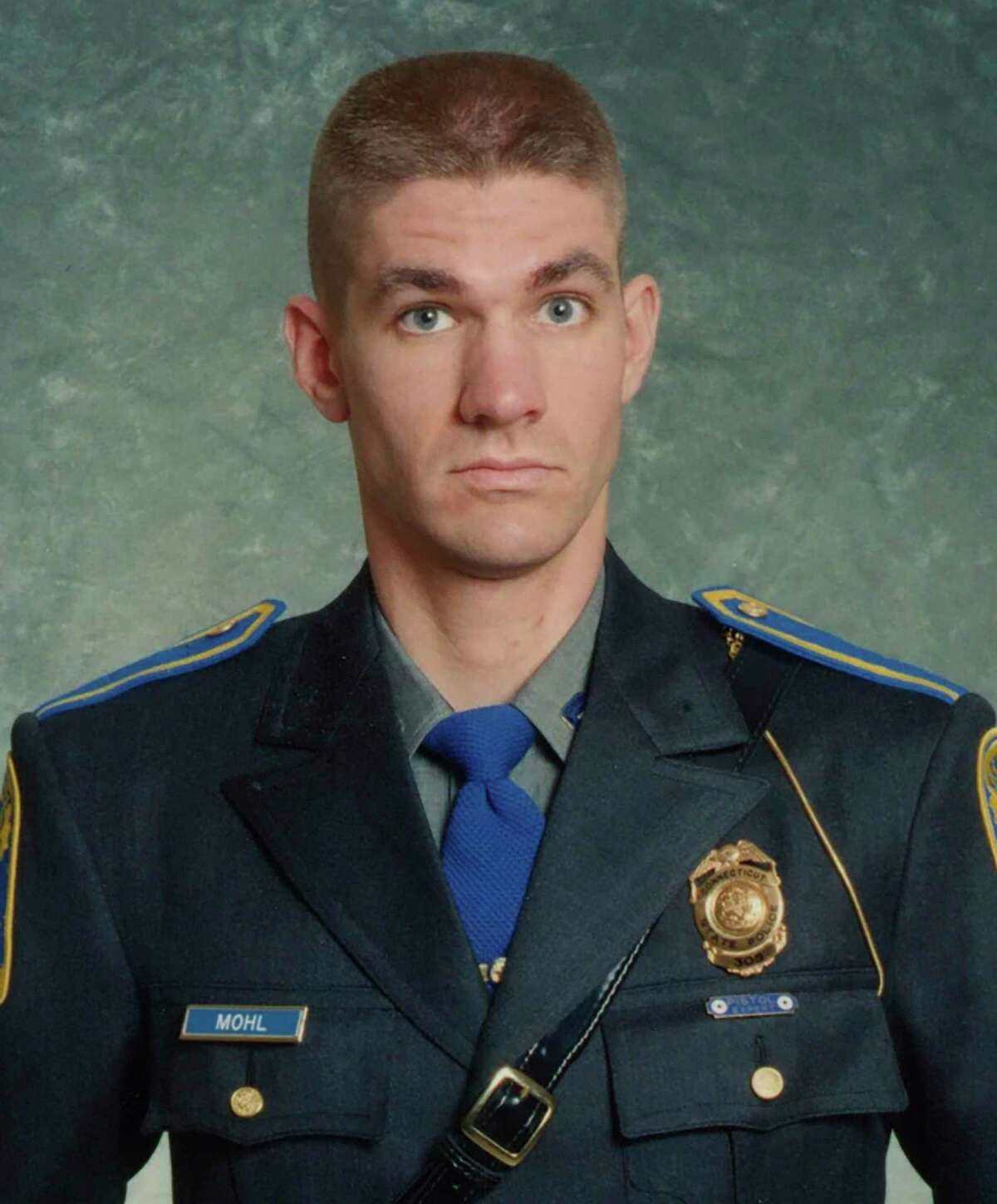 This undated photo provided by the Connecticut State Police shows Sgt. Brian Mohl, a 26-year veteran of their Woodbury department. Mohl called for help about 3:30 a.m. Thursday, Sept. 2, 2021.