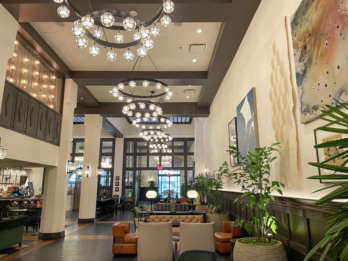 The Hotel Figueroa's grand lobby is packed with plants and large-scale artwork. 