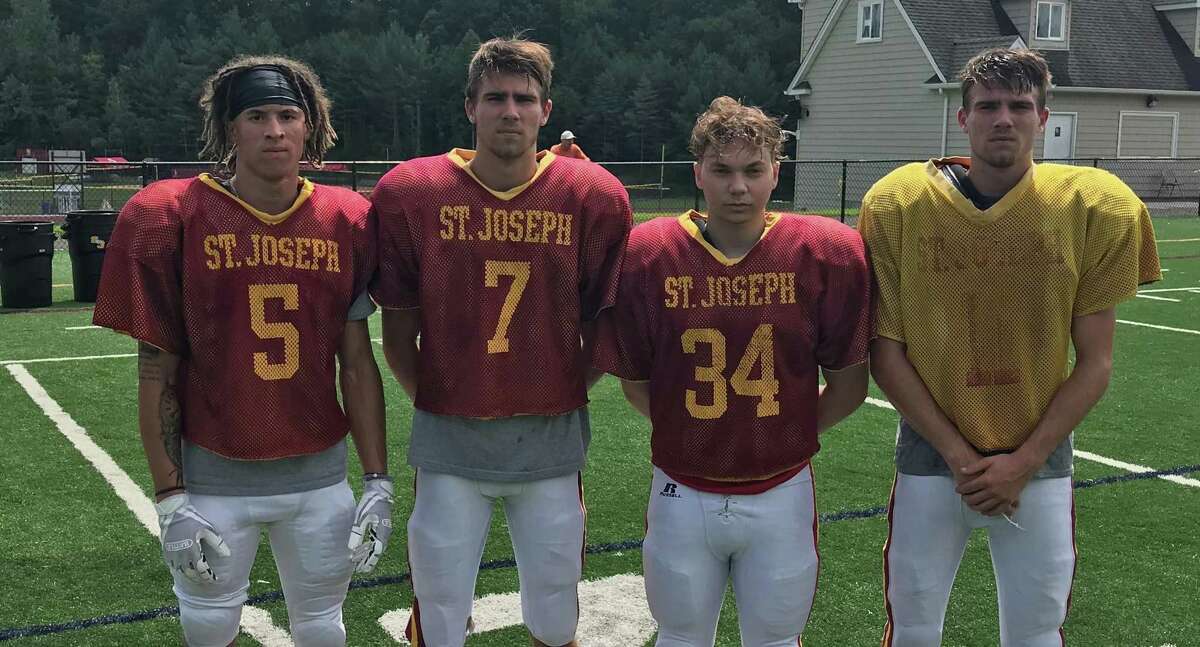Maxwell Warren, Matt Morrissey, Tyler Tortora and Mark Morrissey are team captains for the Hogs.