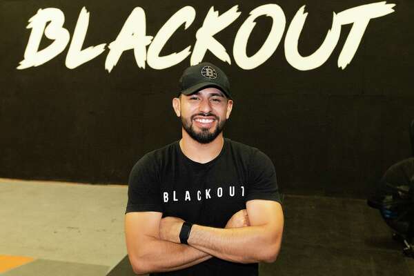 Blackout Training's C.J. Martinez poses for a feature photo, Tuesday, July 27, 2021, at their facility.