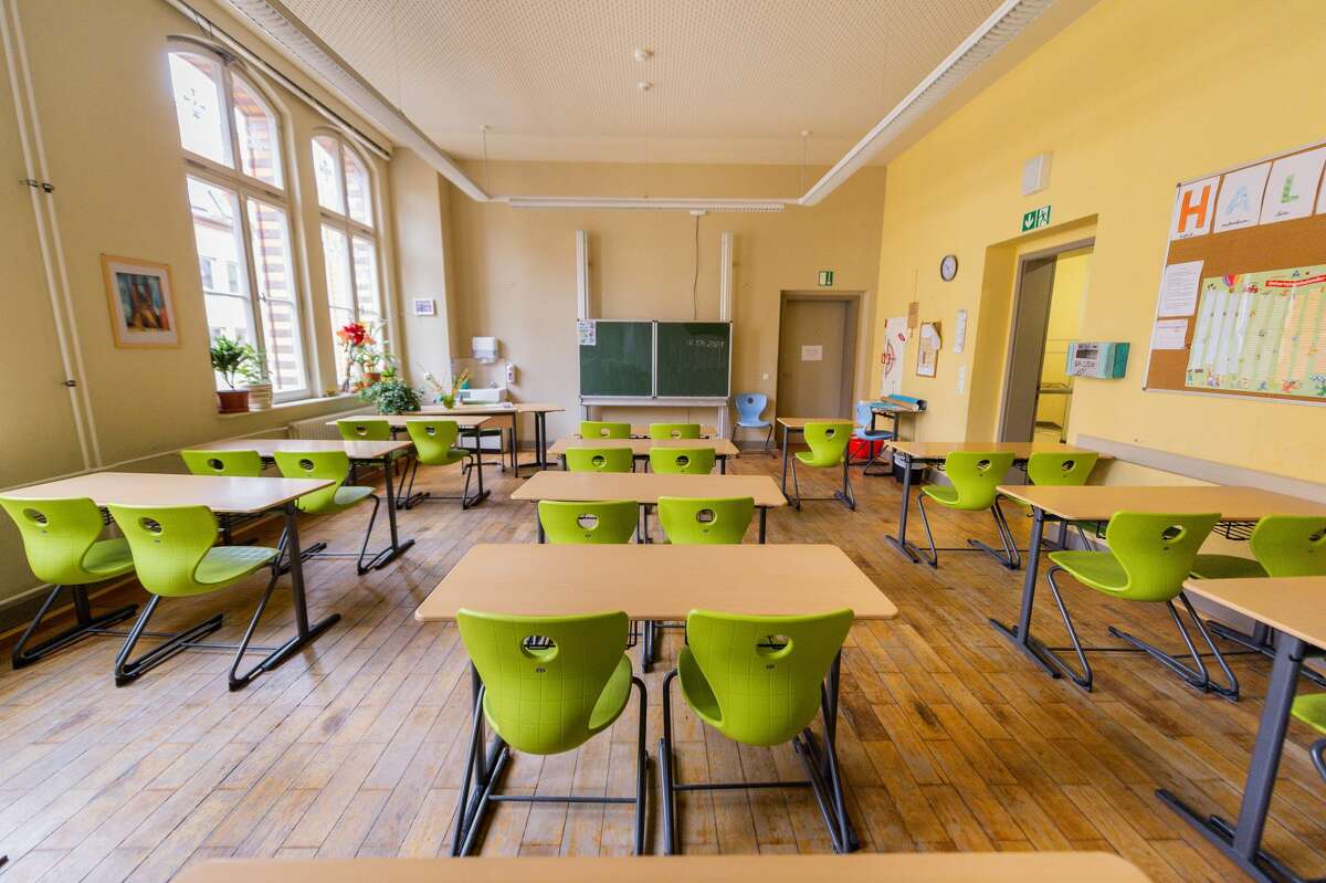 A classroom in the Lyonel Feininger Gymnasium is empty and deserted. (Photo by Holger John/picture alliance via Getty Images)