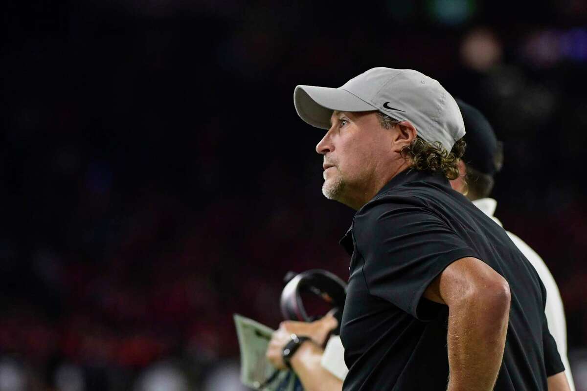 Houston head coach Dana Holgorsen watches from the sidelines as his team plays Texas Tech during the second half of an NCAA college football game Saturday, Sept. 4, 2021, in Houston. (AP Photo/Justin Rex)
