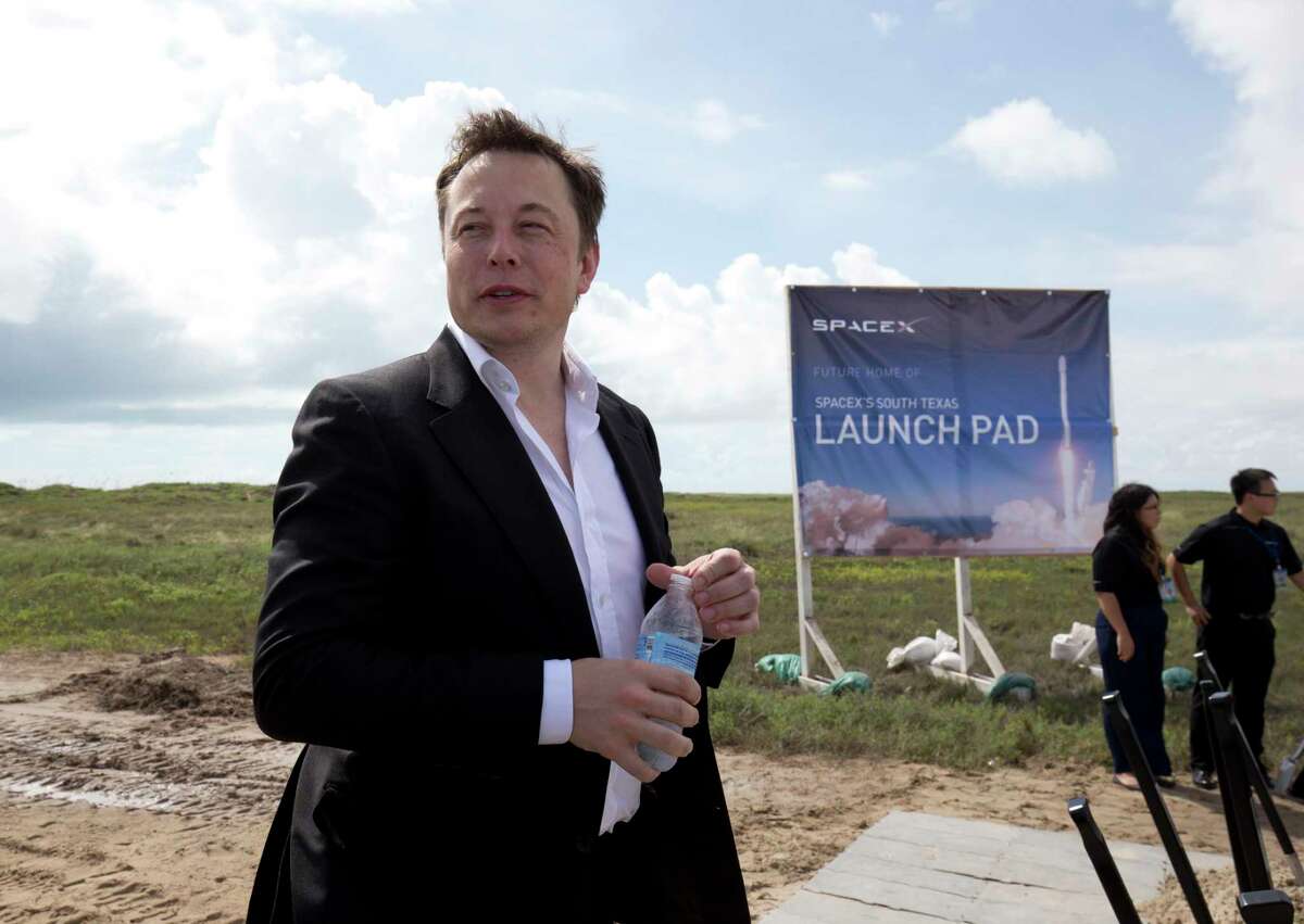 Texas Governor Rick Perry and SpaceX CEO Elon Musk break ground on a new spaceport at Boca Chica Beach in far south Texas (Photo by Robert Daemmrich Photography Inc/Corbis via Getty Images)