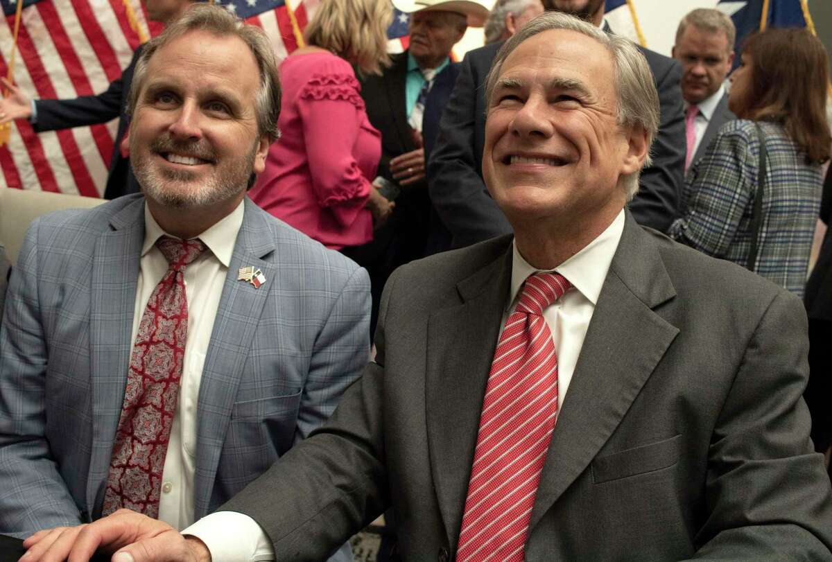 Texas Governor Greg Abbott ceremonially signs into law Senate Bill 1 during an event in Tyler, TX on Tuesday, Sept. 7, 2021. The bill prohibits several forms of voting that were used in Harris County during the 2020 election including drive-through voting and 24 hour voting.