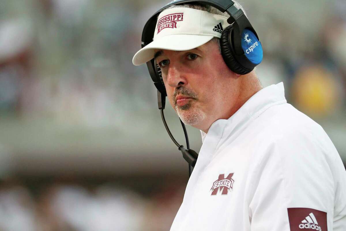 FILE - In this Oct. 19, 2019, file photo, Mississippi State head coach Joe Moorhead looks down field during the second half of an NCAA college football game against LSU, in Starkville, Miss. Two people with knowledge of the situation say Mississippi State has fired coach Joe Moorhead after just two seasons. They spoke to The Associated Press on condition of anonymity because an announcement had not yet been made by the school. A meeting was scheduled Friday, Jan. 3, 2020, with Moorhead and athletic director John Cohen. (AP Photo/Rogelio V. Solis, File)