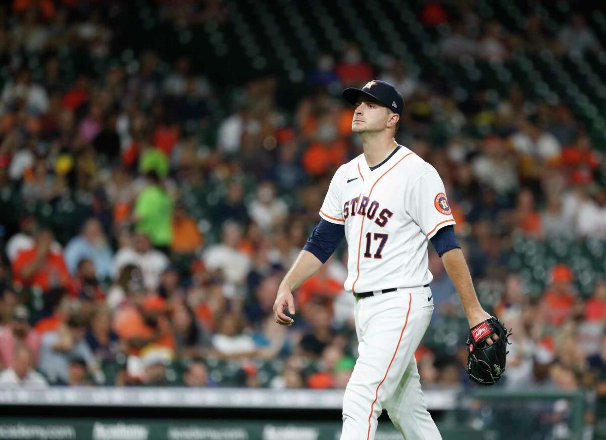 Houston Astros starting pitcher Jake Odorizzi (17) walks back to the dugout after striking out Seattle Mariners Mitch Haniger (17) during the third inning of an MLB baseball game at Minute Maid Park, Tuesday, September 7, 2021, in Houston.