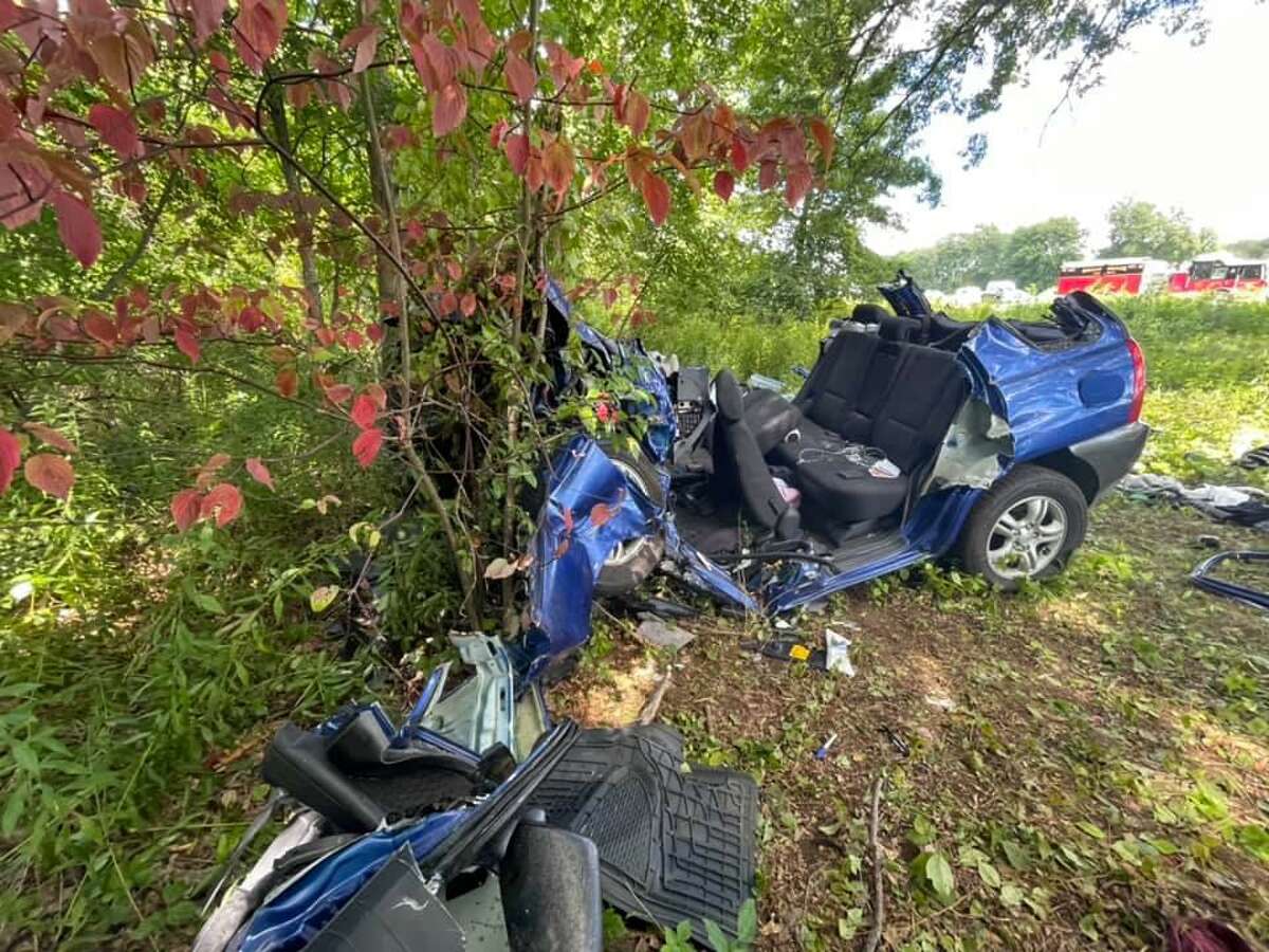 Fire officials said it took crews less than 30 minutes to free a driver, who was pinned between the dashboard and the engine compartment, on Interstate 91 near Exit 44 in East Windsor, Conn., on Tuesday, Sept. 7, 2021.