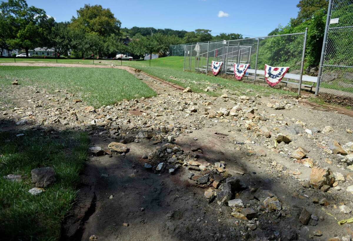 The Pemberwick Park baseball field is damaged from flooding in the Pemberwick section of Greenwich, Conn. Tuesday, Sept. 7, 2021. The ball field got washed out from last week's heavy rainfall from the remains of Hurricane Ida.