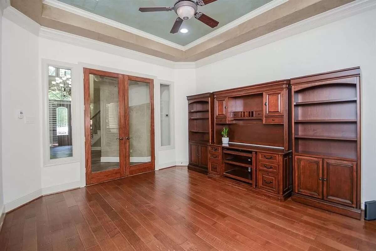 The office comes with the furniture and a set of French doors.