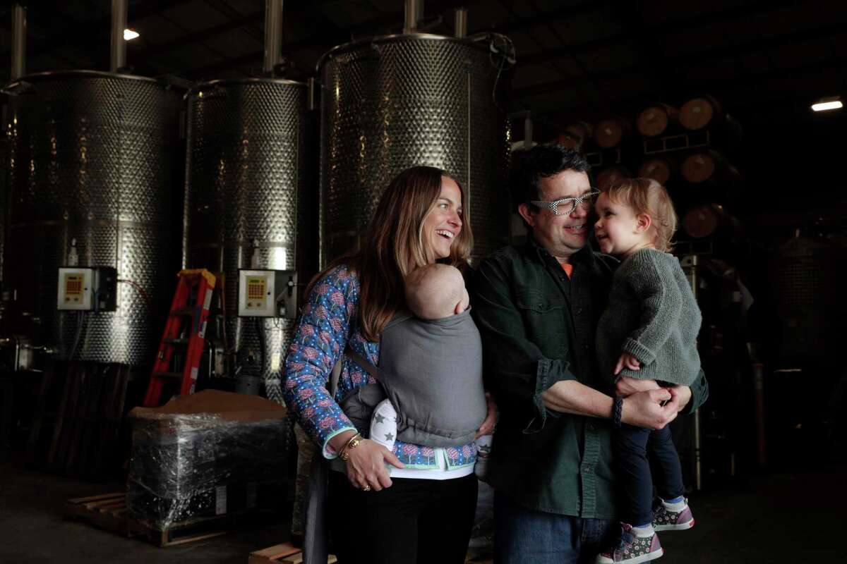 Winemaker Hardy Wallace with his wife, Kate Graham, and children Maple and Herve. The family is starting a new winery.