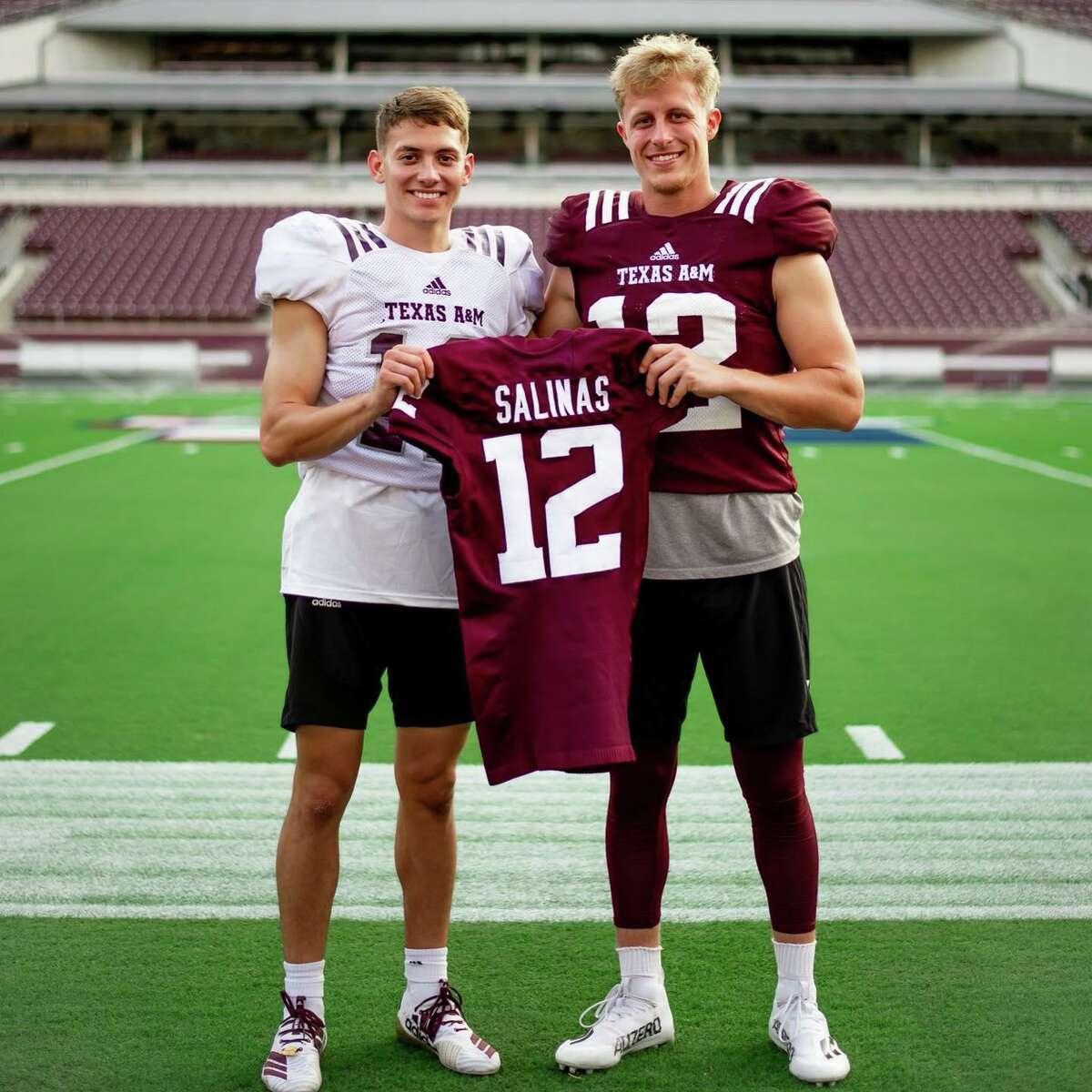Texas A&M head yell leader Memo Salinas receives his 12th Man jersey on Sept. 2, 2021 from 12th Man Connor Choate.