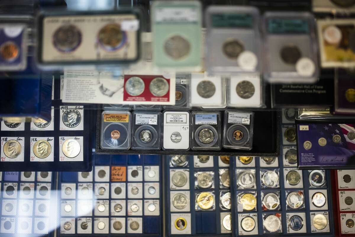 Coins, both old and new, are displayed at Collector's World Wednesday, Sept. 8, 2021. The business, located at 1020 S. Saginaw Rd. in Midland, is celebrating its 40th anniversary this month. (Katy Kildee/kkildee@mdn.net)