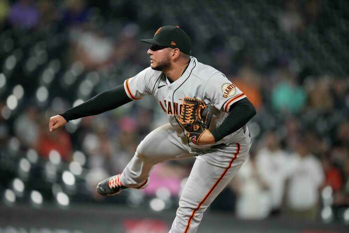 DENVER, CO - JUNE 6: San Francisco Giants first baseman LaMonte Wade Jr.  (31) bats during a game between the San Francisco Giants and the Colorado  Rockies at Coors Field on June