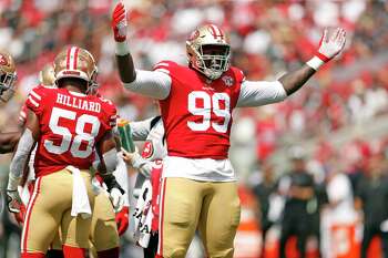 San Francisco 49ers defensive tackle Javon Kinlaw (99) runs onto the field  during an NFL football game against the Arizona Cardinals, Sunday, Jan.8,  2023, in Santa Clara, Calif. (AP Photo/Scot Tucker Stock