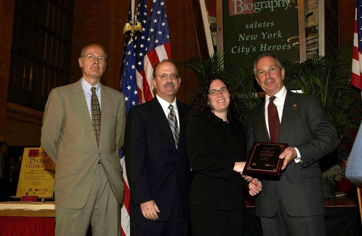 Amy Zelson Mundorff accepts an award from former New York City Mayor Mike Bloomberg in 2002 for her heroic work in helping to identify victims of the Sept. 11, 2001, terrorist attacks.