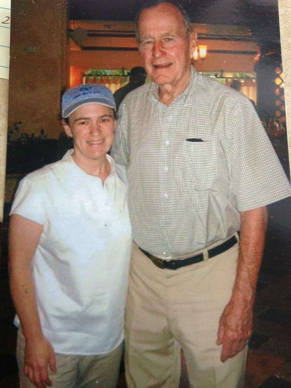 Amy Zelson Mundorff with President George H.W. Bush when Mundorff was called to Thailand to help identify the remains of Tsunami victims.