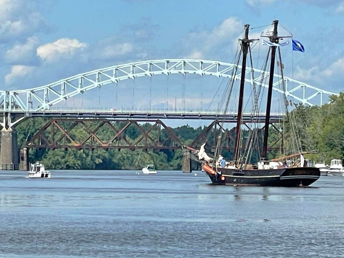 Middletown Harbormaster Drew France took photos of the Amistad when it passed by Harbor Park on the Connecticut River Tuesday on its way to Hartford.