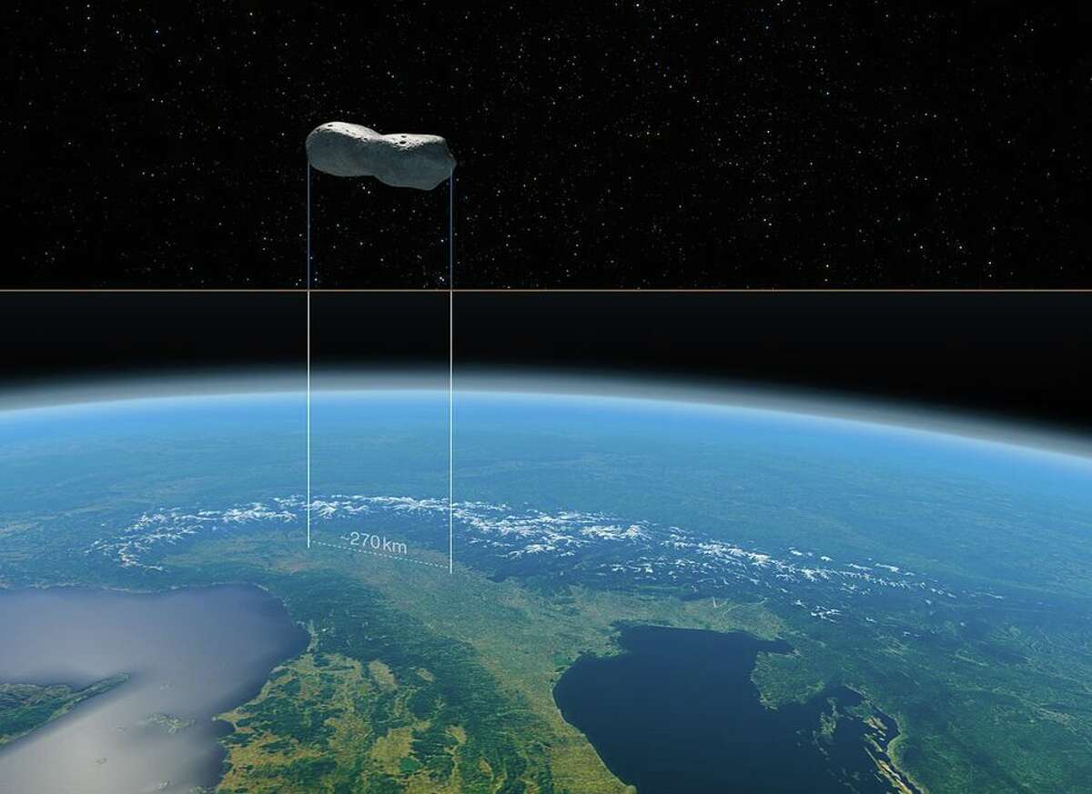 See a huge, dog-bone-shaped asteroid as big as New Jersey, with its own  moons