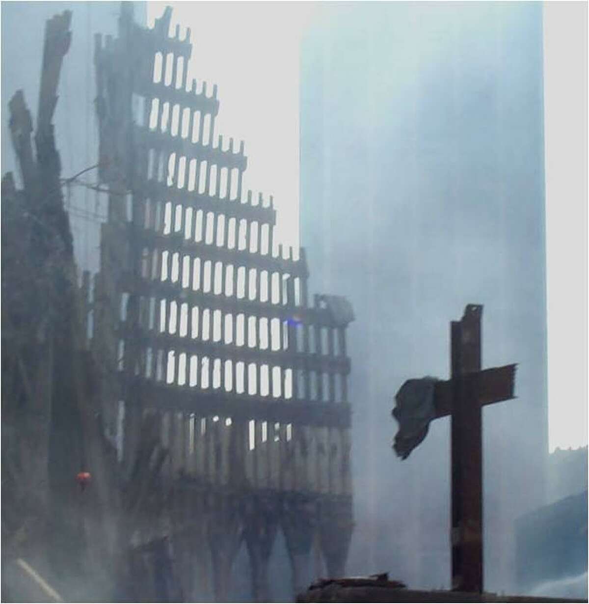 The Ground Zero Cross can be seen amid the devastation of the World Trade Center following the 9/11 attacks in this mid-October 2001 photo.