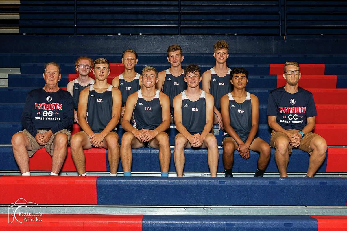 The USA Boys Cross Country team poses for a photo. (Kaitlin Gunsell of Kaitlin's Klicks/For the Tribune)