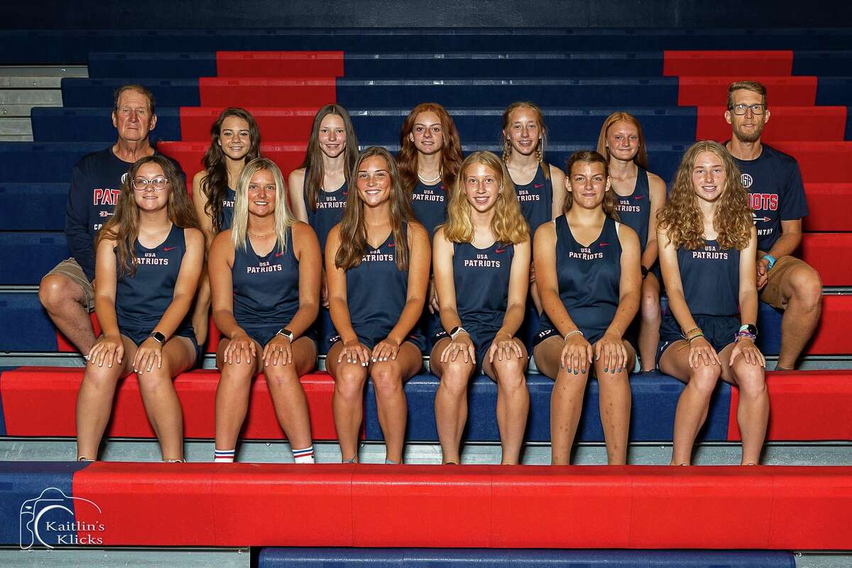 The USA Girls Cross Country team poses for a photo. (Kaitlin Gunsell of Kaitlin's Klicks/For the Tribune)