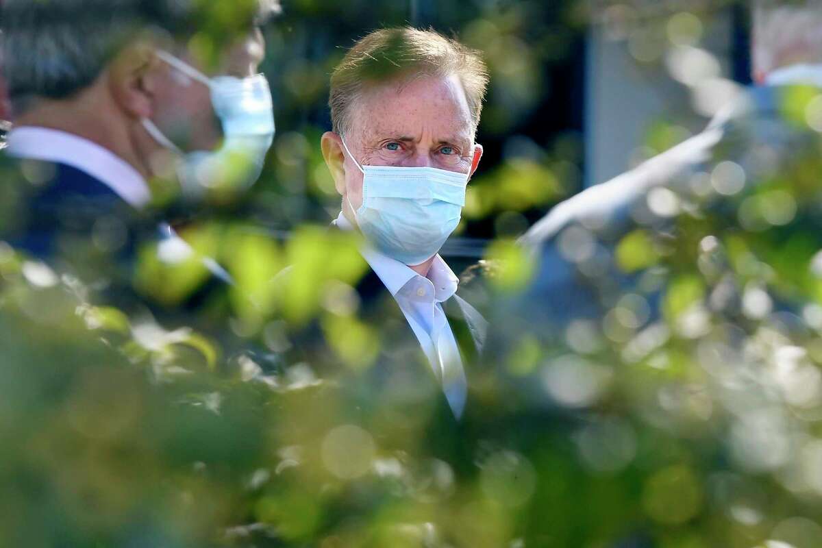 Connecticut Gov. Ned Lamont, listens during a news conference at Goodwin University Wednesday, Sept. 8, 2021, in East Hartford, Conn. Lamont on hand to discuss the expanded Biden Child Tax Credit.