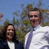 Vice President Kamala Harris stands on stage with California Gov. Gavin Newsom at the conclusion of a campaign event at the IBEW-NECA Joint Apprenticeship Training Center in San Leandro, Calif., Wednesday, Sept. 8, 2021.