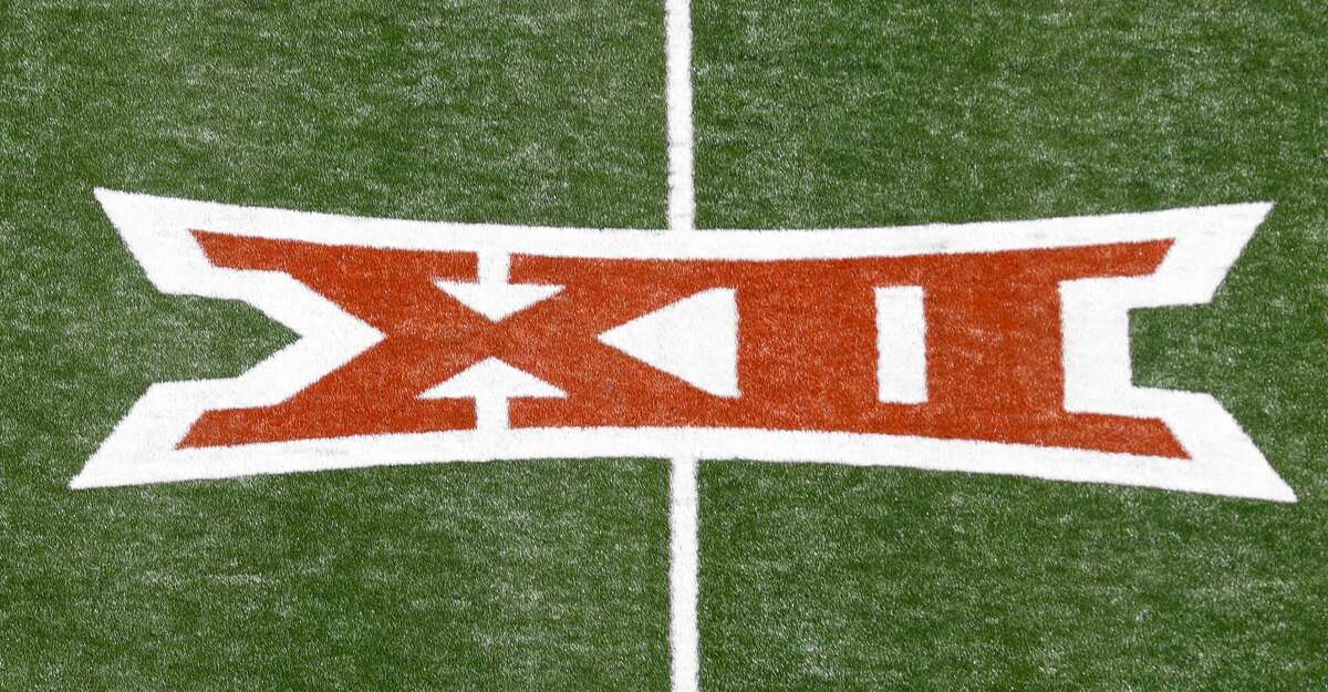 A Big 12 logo is seen on the turf before the game between the Texas Longhorns and the Louisiana Ragin' Cajuns at Darrell K Royal-Texas Memorial Stadium on September 04, 2021 in Austin, Texas. (Photo by Tim Warner/Getty Images)