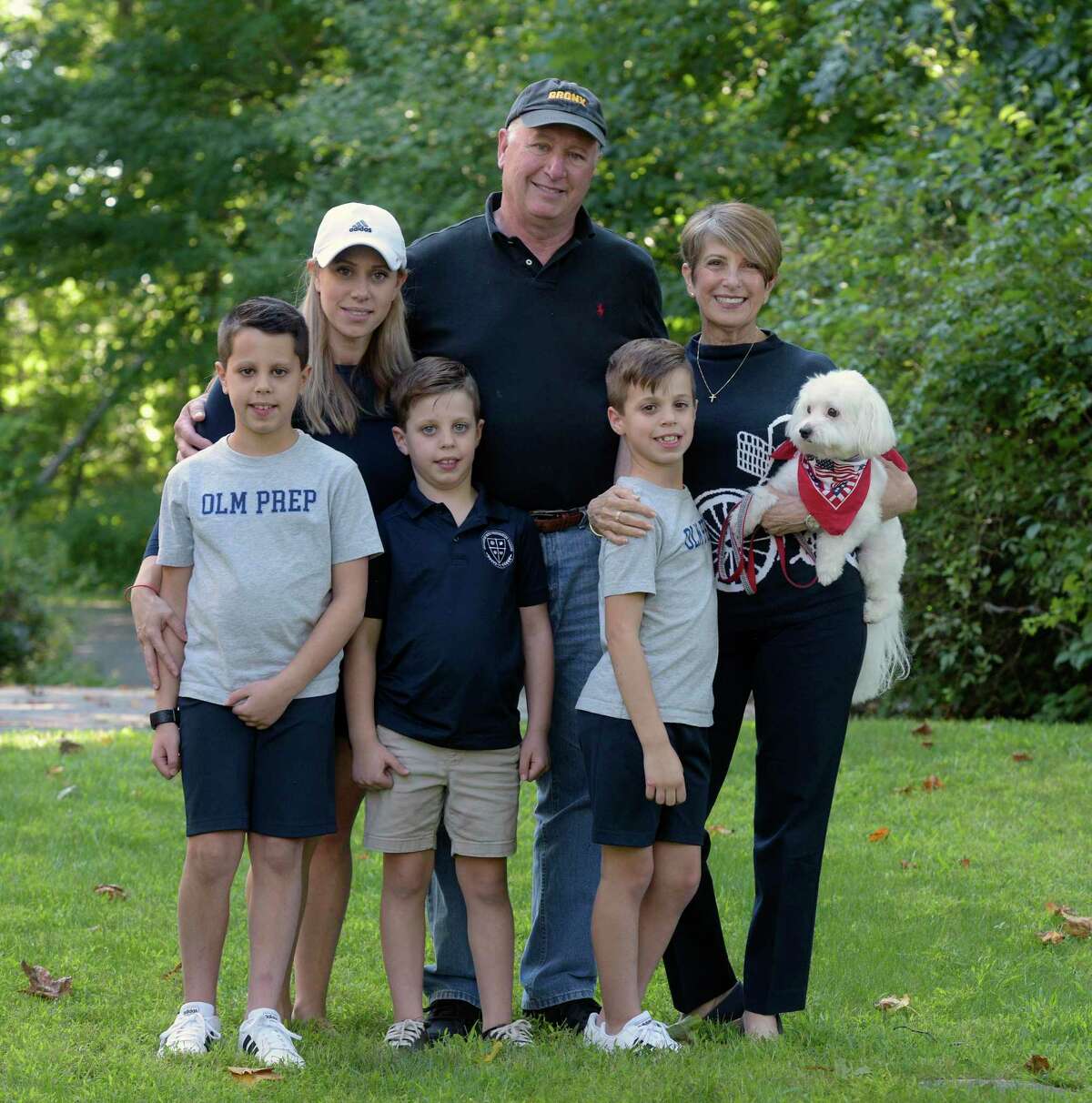 Robert Hofmiller, center, of Guilford, and his family, including wife Rosemary, right, and daughter Jacqueline Ciocca, left, of Madison. Hofmiller lost his sister Judith Hofmiller, of Brookfield, in the twin towers on 9/11. With them are his grandsons Luke Ciocca, left, 10, Peter Ciocca, 6, and Jack Ciocca, right, 8.