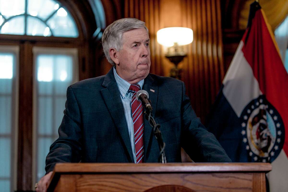 Gov. Mike Parson listens to a media question during a press conference. (Photo by Jacob Moscovitch/Getty Images)