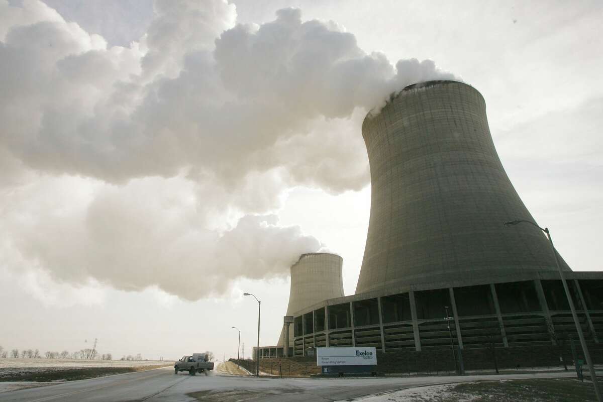 Steam billows from the cooling towers at Exelon's nuclear power generating station February 17, 2006 in Byron, Illinois. (Photo by Scott Olson/Getty Images)