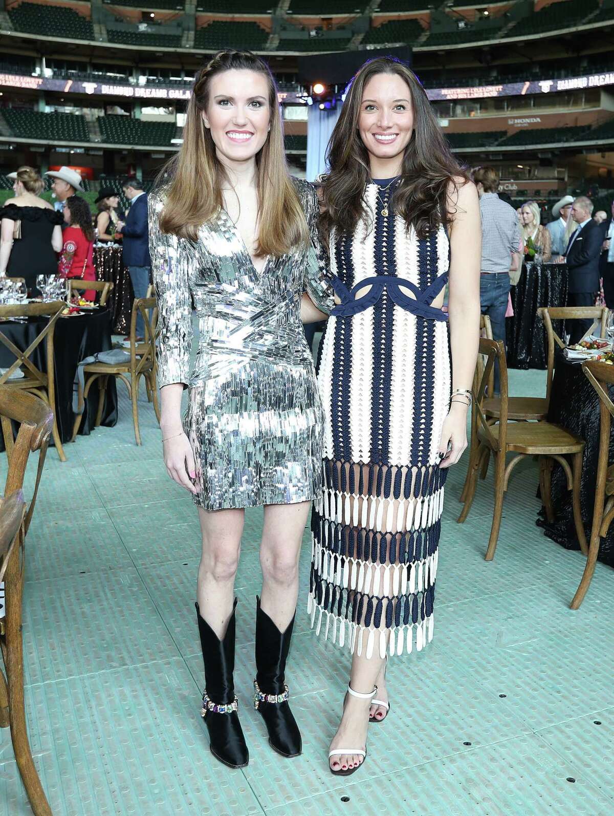 Heather Almond, left, and Kylie Bumgardner, right during the Astros Foundation’s sixth annual Diamond Dreams Gala presented by Chevron, featuring singer-songwriter and Texas native Lyle Lovett and his Large Band on the field at Minute Maid Park, Thursday, September 9, 2021, in Houston.