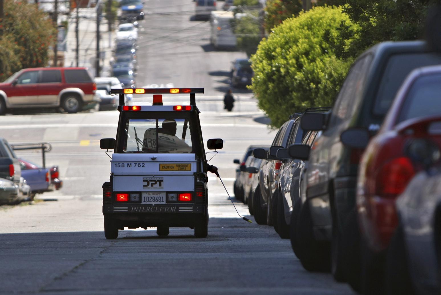 Court: Chalked tires violate rights of Michigan woman with 14 parking  tickets