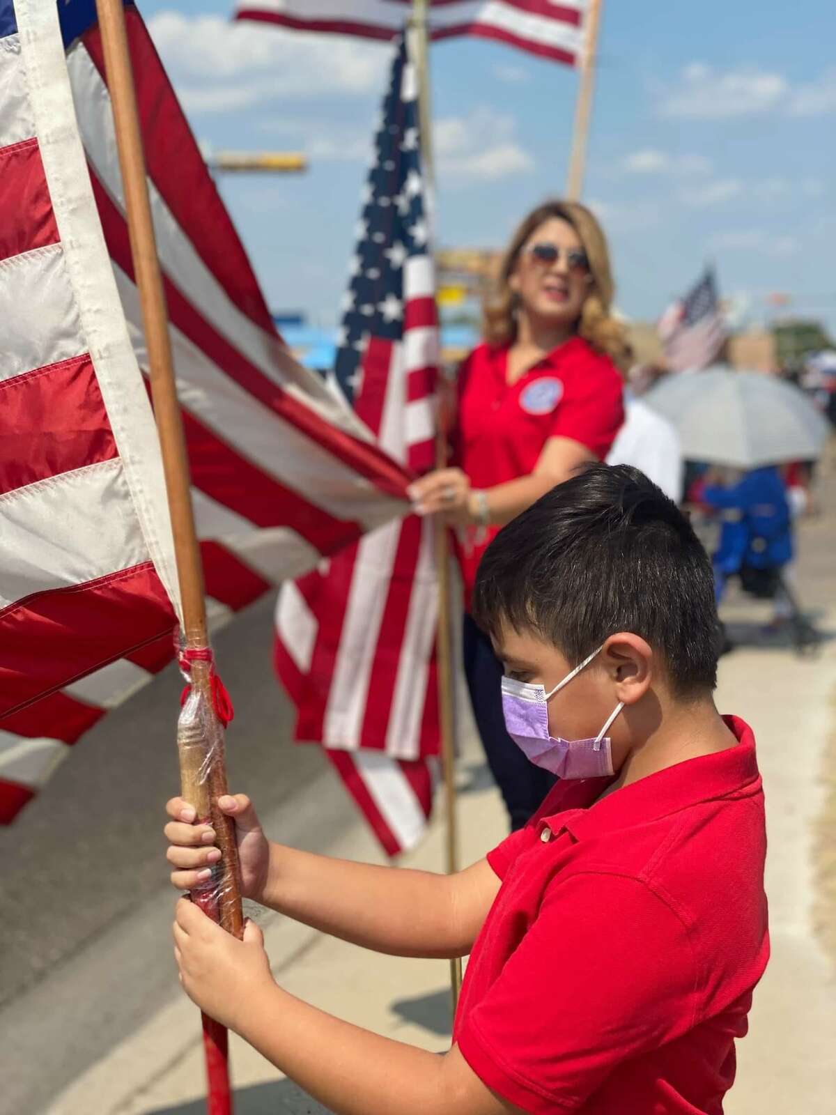 Young boy Angel Contreras watched the procession and stated he will always “remember this day” as he and others honored slain Laredo Marine Lance Cpl. David Lee Espinoza on Friday, Sept. 10, 2021.