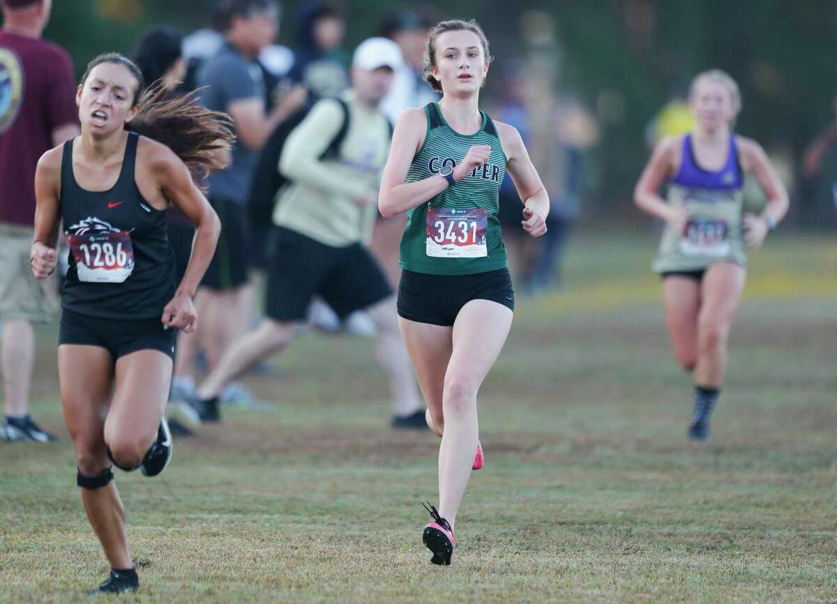 John Cooper’s Megan Day finished fifth in the Dog Pound cross country meet at Magnolia High School, Saturday, Sept. 11, 2021, in Magnolia.