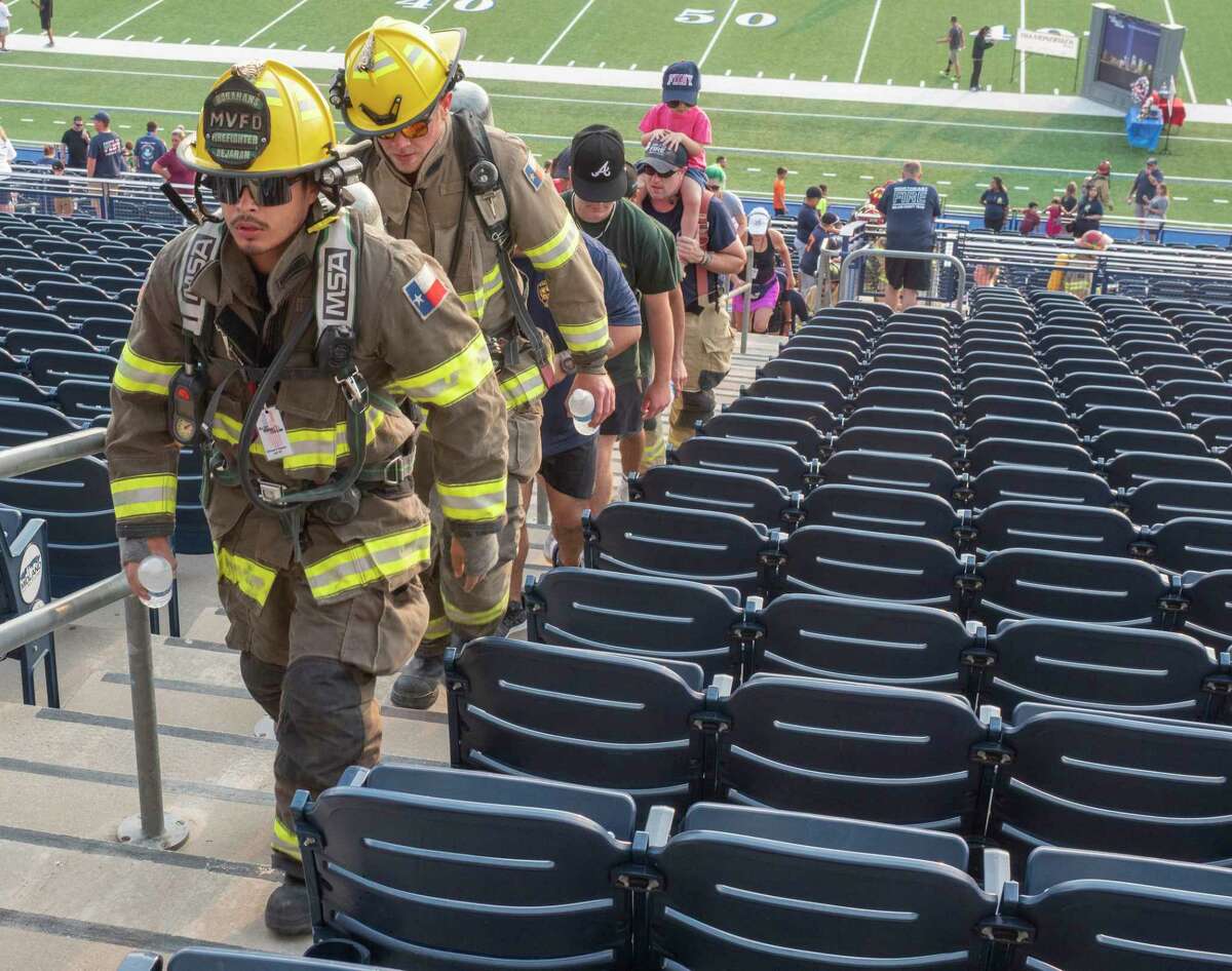 More than 400 area first responders, family members and members of the public walk the bleachers 09/11/2021 at Grande Communications Stadium, climbing the equivalent of 110 stories in remembrance of first responders that gave their life, as well as civilians who died in the Sept, 11 2001 terror attacks. Tim Fischer/Reporter-Telegram