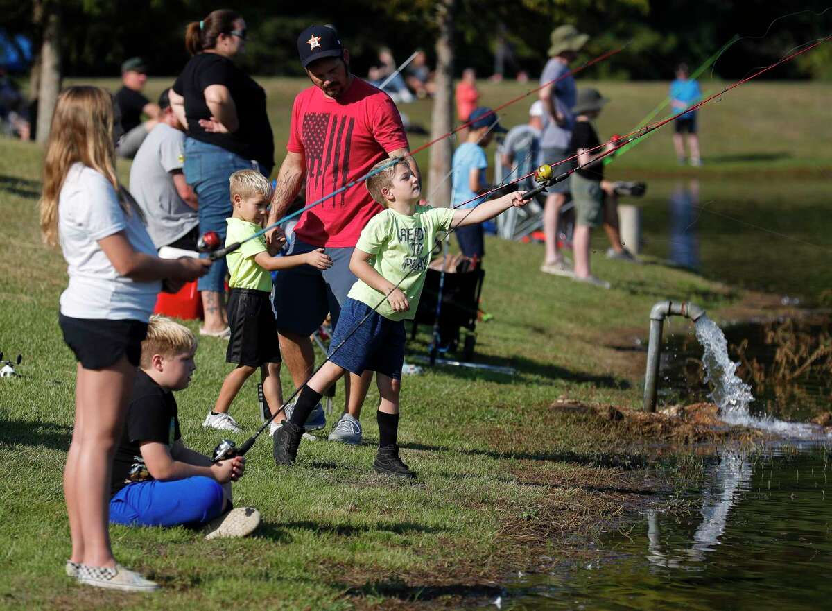 Jaxon Peruzzi casts his fishing line out during KidFish at Carl Barton, Jr. Park, Saturday, Sept. 11, 2021, in Conroe. The free event gave children 16 years old and young a chance to learn and gain appreciation for the sport of fishing as well as awareness for the environment.