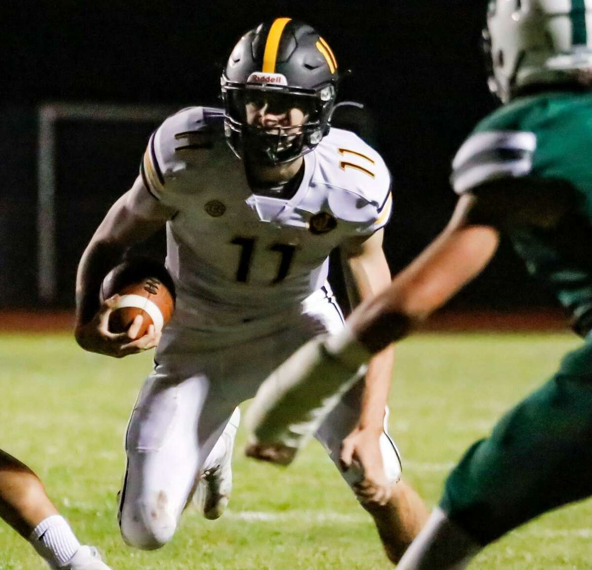 John Neider ran for three touchdowns in Law's 34-7 win against Guilford.