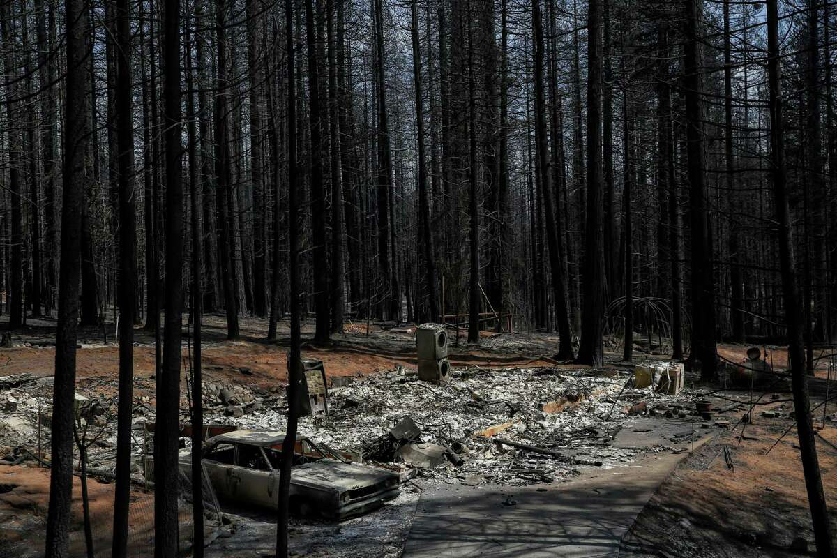 Debris in a once standing home in Grizzly Flats, Calif. Caltrans officials said they were taking steps in preparation of potential debris-slides in areas scarred by wildfires.