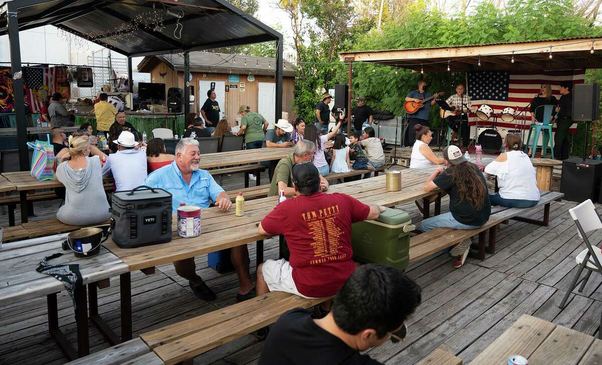 Musicians gather at Wizard Wicks for the “Musicians for Marines” tribute to Lance Corporal David Lee Espinoza on Saturday, Sept. 11, 2021. A plate sale and live music helped raise funds for Espinoza’s family.