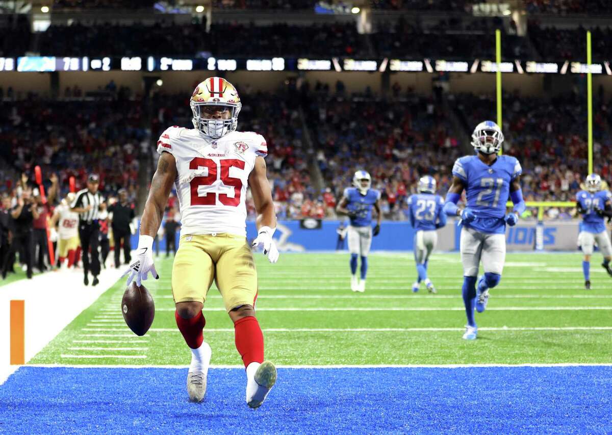 Elijah Mitchell arrives in the end zone after his 38-yard run in the second quarter, giving the 49ers a 14-7 lead over the Lions.