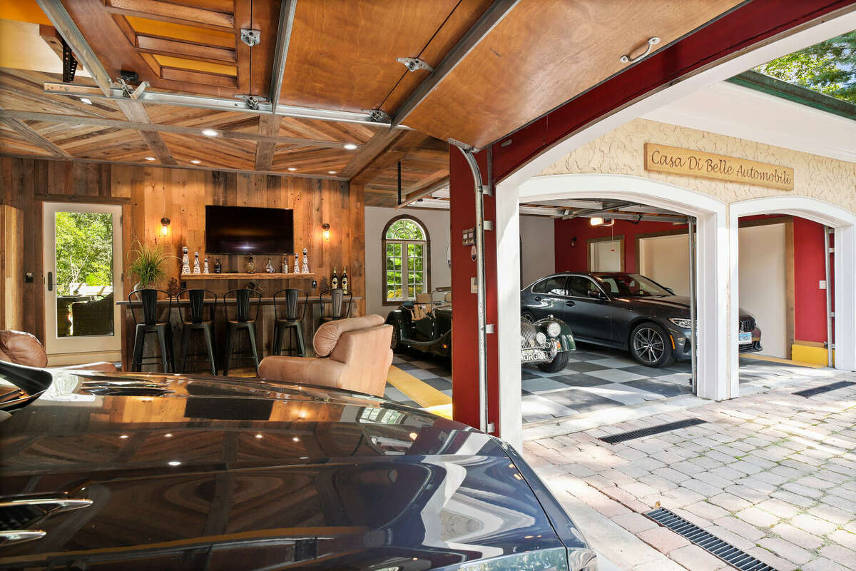 The home on 30 Crossbow Lane in Easton, Conn.  has a five-car garage and "crew pit lounge." 