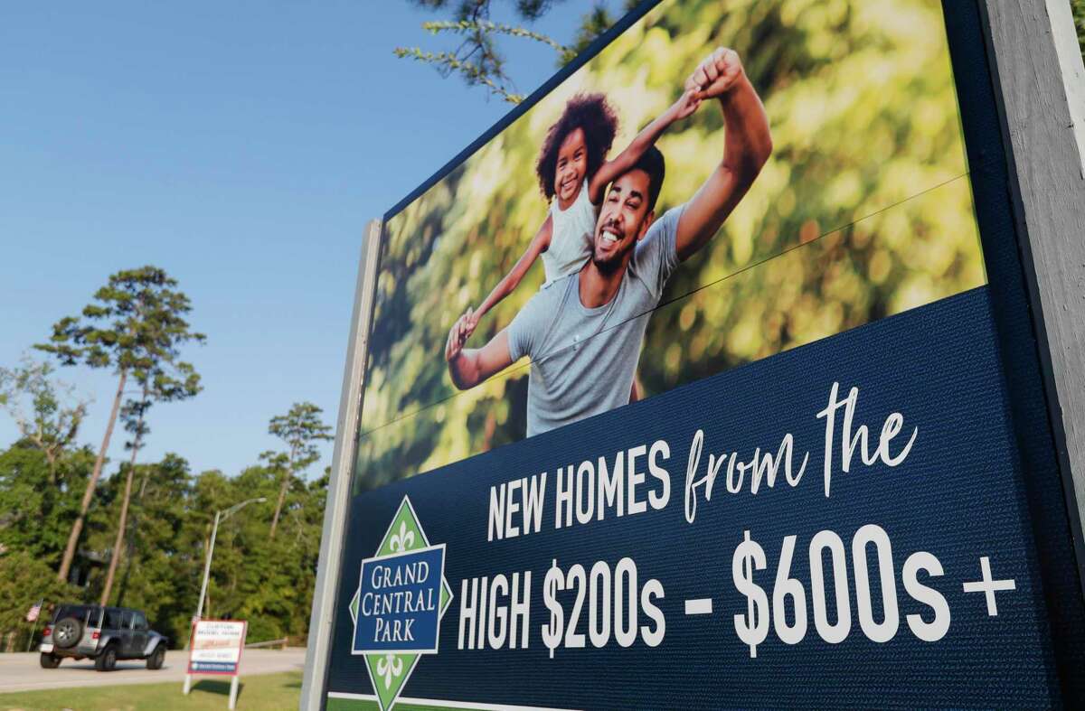A sign promotes homes in Grand Central Park ranging from the high $200,000 to more than $600,000, Friday, Sept. 10, 2021, in Conroe.